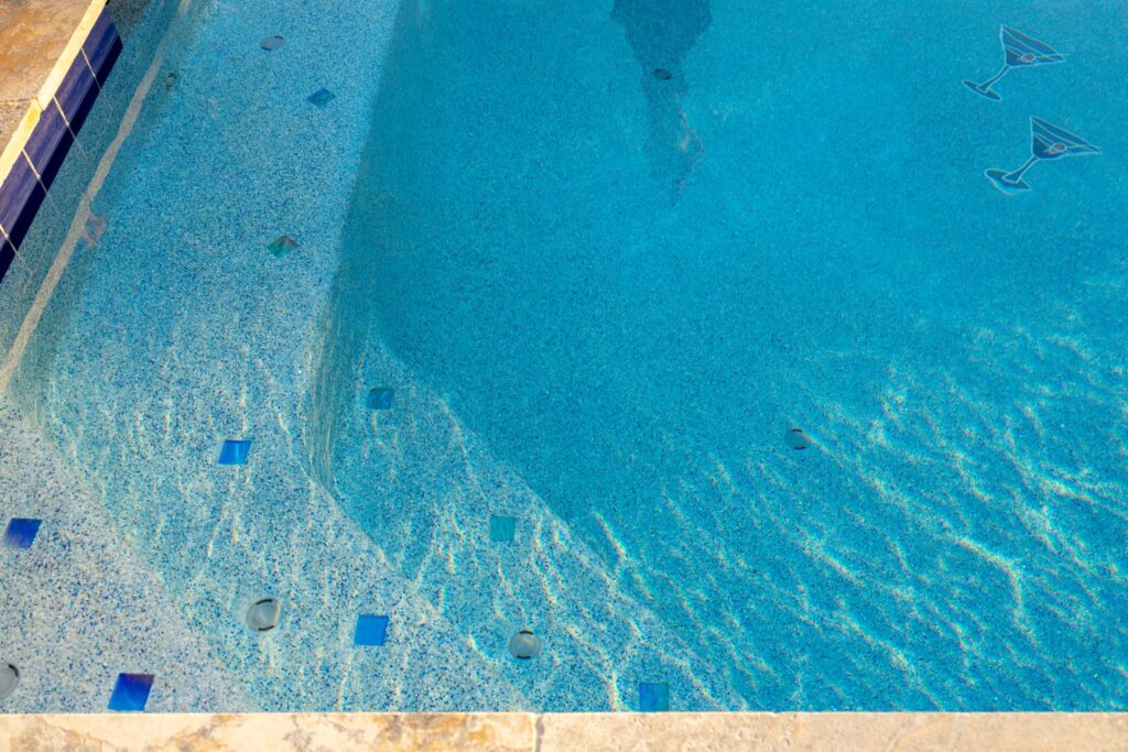 clean bottom of swimming pool